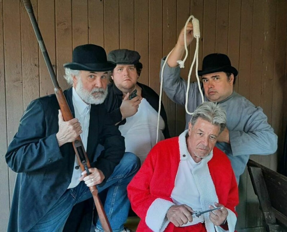Joe Bonamico (Sam Byck), seated, Mark Durbin (Proprietor), left, Zac Rusk (Leon Czolgoszc) and Bart Herman (Charles Guiteau) ‘Assassins’ coming to the Trumpet pavilion stage