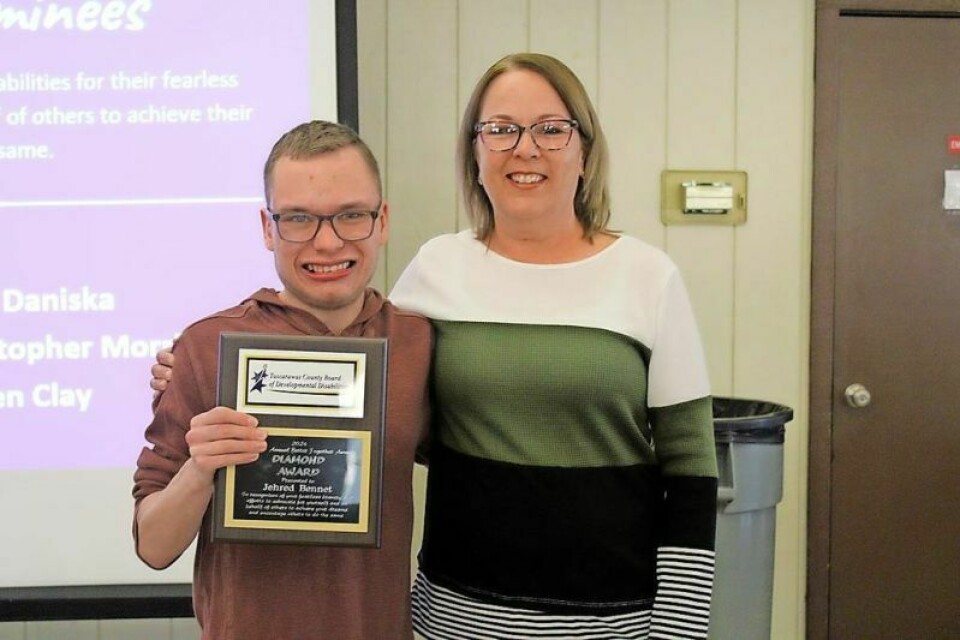 Jehred Bennet with his mother Christy. Jehred Bennet wins Diamond Award