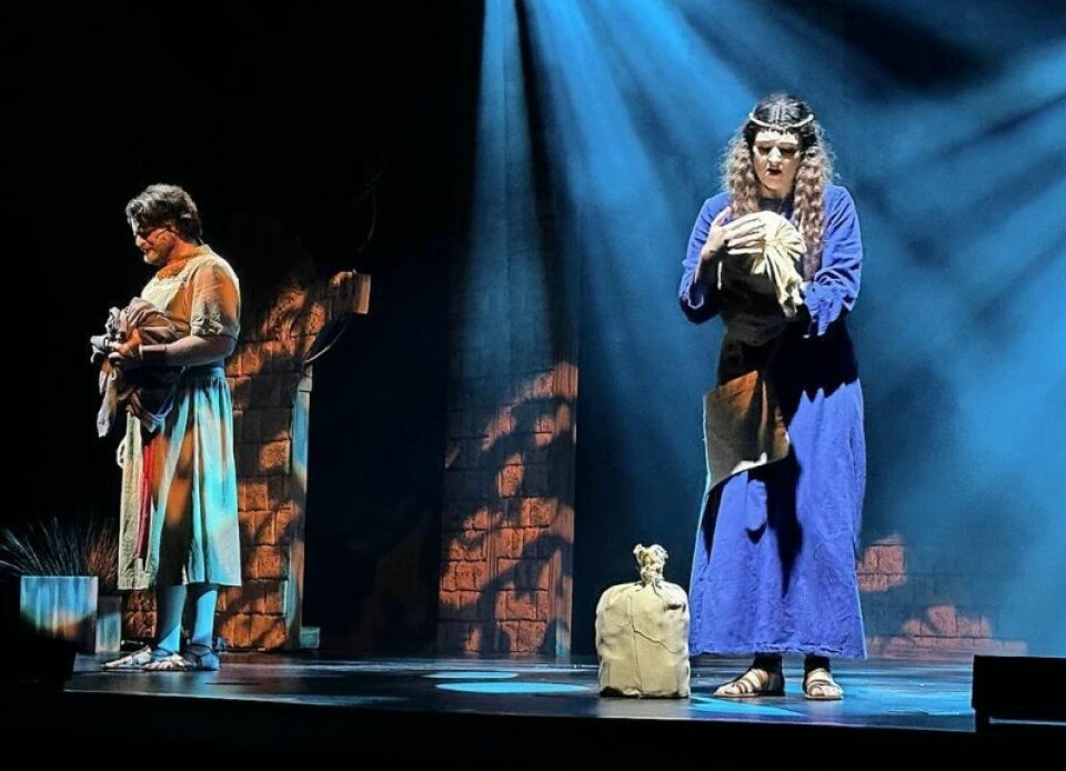 Kyle Miller, who plays Ruth, right, joins Logan Harper’s Boaz on stage for a musical number during the production of “Ruth,” which continues to run through Nov. 9 at Ohio Star Theater. Actors find friendship, unity in sharing roles