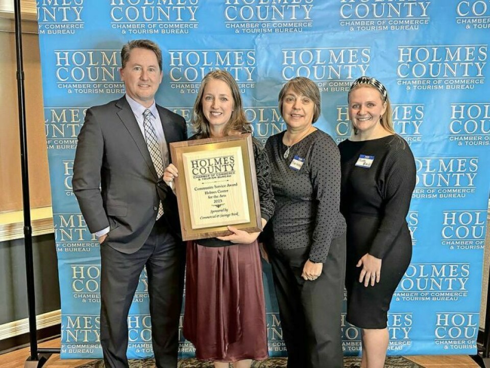 Holmes Center for the Arts Executive Director Holley Johnson, with plaque, joins board members Jay McCulloch, left, Marianne Mader and Olivia Mirich after accepting the chamber's 2023 Community Service Award. HCA, Johnson honored for expanding arts in Holmes County