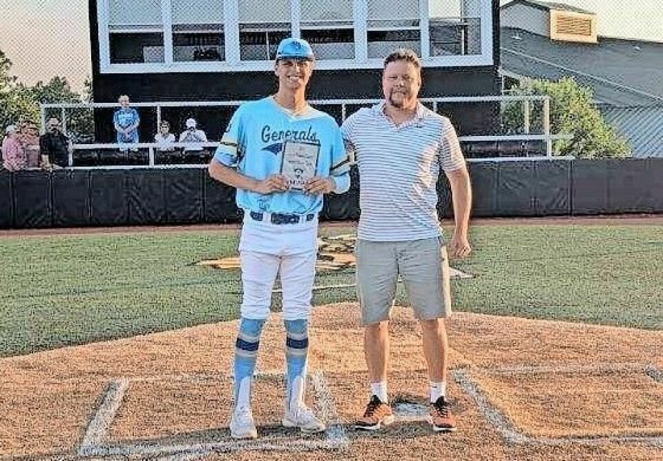 Wooster High senior left-hander Ashton Still, left, shown with Aaron Dorksen, was named the MVP for the Wayne-Holmes team at the Wayne-Holmes Senior All-Star Game at The College of Wooster on June 19. Top players showcase skills at W-H Senior All-Star Game