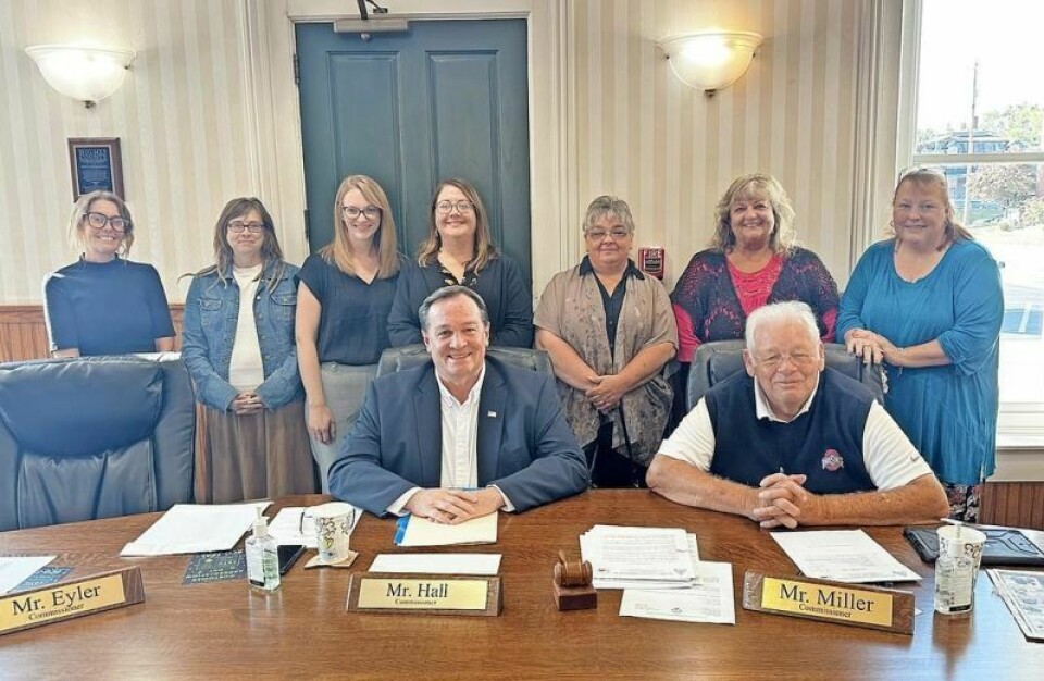 Holmes County commissioners Dave Hall and Joe Miller are joined by area health recovery advocates Kary Prince, left, clinical manager with One-Eighty; Sarah Doohan, clinical director with Anazao; Heather Dean, program director at Mental Health & Recovery Board of Wayne & Holmes Counties; Tiffany Kestner, CEO of Counseling Center of Wayne & Holmes Counties; Rhoda Williams, chemical dependency counselor with One-Eighty; Tina Zickefoose, advocate with One-Eighty; and Dorrie Miller, finance director of WHMHRB, to celebrate the county proclamation making September Recovery Month. Holmes commissioners proclaim September as Recovery Month