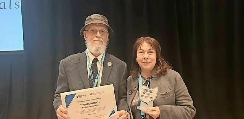 Thomas Hisrich, left, and Gail Garbrandt Ohio election officials receive certification
