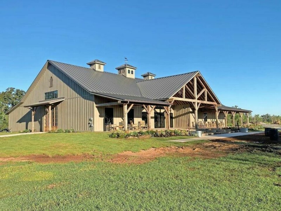 When reassembled, OVBS furnished and installed 6,000 square feet of reclaimed roof sheathing, hand-hewn timbers for the grand and side entrances, 14,000 square feet of 12” reclaimed siding for the finished interior and the 1870’s Gothic louvers. Navarre barn finds new home in Texas
