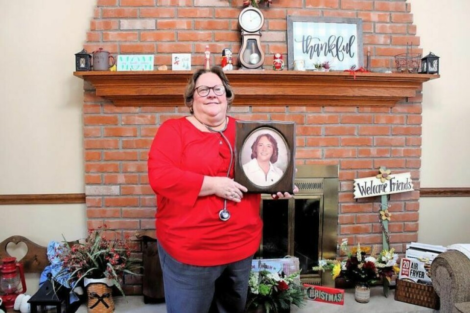 Dr. Denise McEnroe-Petitte of New Philadelphia, professor of nursing technology at Kent State Tuscarawas, with her first stethoscope and picture when she graduated from nursing. She is retiring at the end of 2023 with plans to travel and spend more time with family. New Philadelphia woman retires from 46 years in nursing