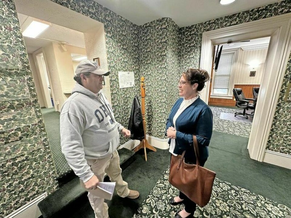Steve Johnson, one of several people running for what will be a vacant seat in the commissioner office in Holmes County, chats with new Millersburg Mayor Kelly Hoffee. New Millersburg mayor eager to collaborate with county