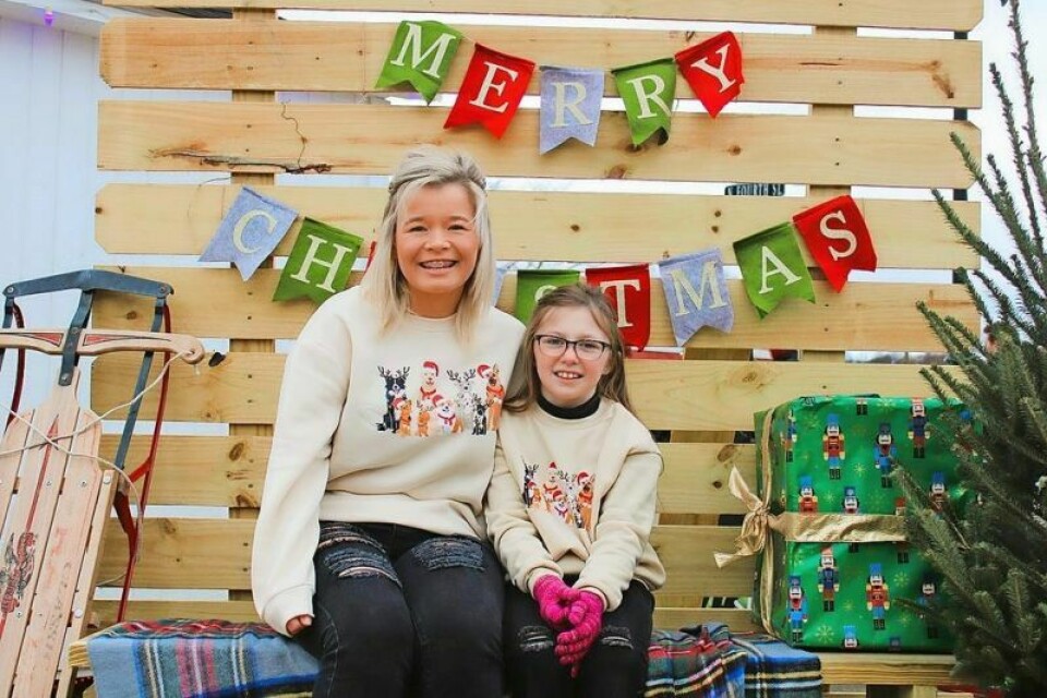 Alexius Taylor and her stepdaughter Makenna, 9, of Gnadenhutten enjoyed the festival in their matching sweatshirts. Christkindlmarket brings Christmas magic to Dennison