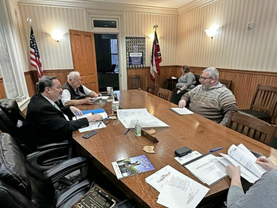 New Holmes County Veterans Services Director Dan Stackhouse, right, met with Holmes County commissioners Dave Hall, front, and Joe Miller to discuss the possibility of new flooring for the veterans office, which he said was worn and presented a danger to veterans. The commissioners agreed to the idea. Holmes veterans office all set for new flooring