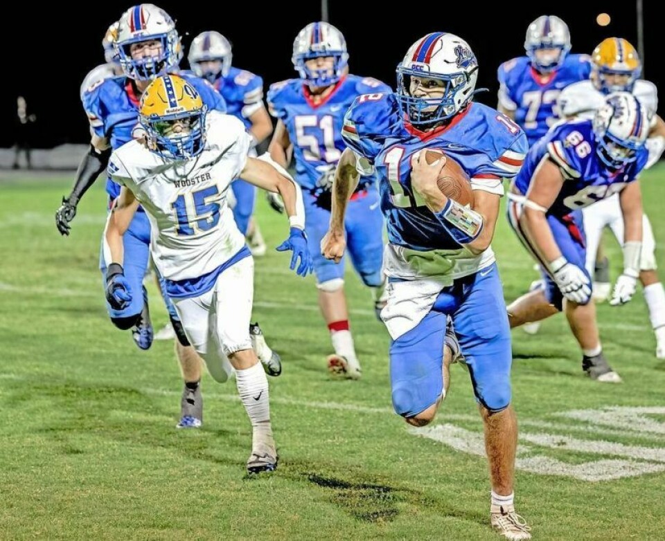 West Holmes senior quarterback Morgan Smith, right, had a monster junior year in which racked up more than 5,000 combined passing and rushing yards and 62 total TDs. He has a strong corps of receivers and linemen once again. Countdown to kickoff — a 2024 HS football primer