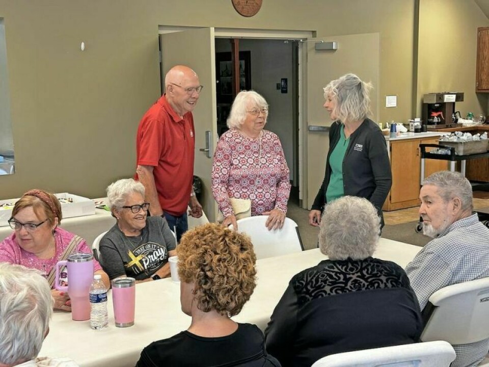 Diana Youngen-Beaber and her husband Wayne enjoy chatting with friends during her retirement party from Alpine Hills Museum. Youngen-Beaber played a vital role in keeping the museum afloat during difficult days. Youngen-Beaber’s ties to Alpine Hills Museum celebrated