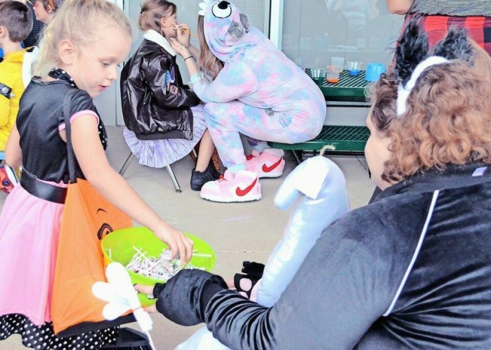 Guests at the Wayne County Schools Career Center’s Trades & Treats event receive treats and sit for face painting at last year’s event. This year’s free event will be held Thursday, Oct. 12 from 5-6:30 p.m. Learn about WCSCC programs at Trades & Treats