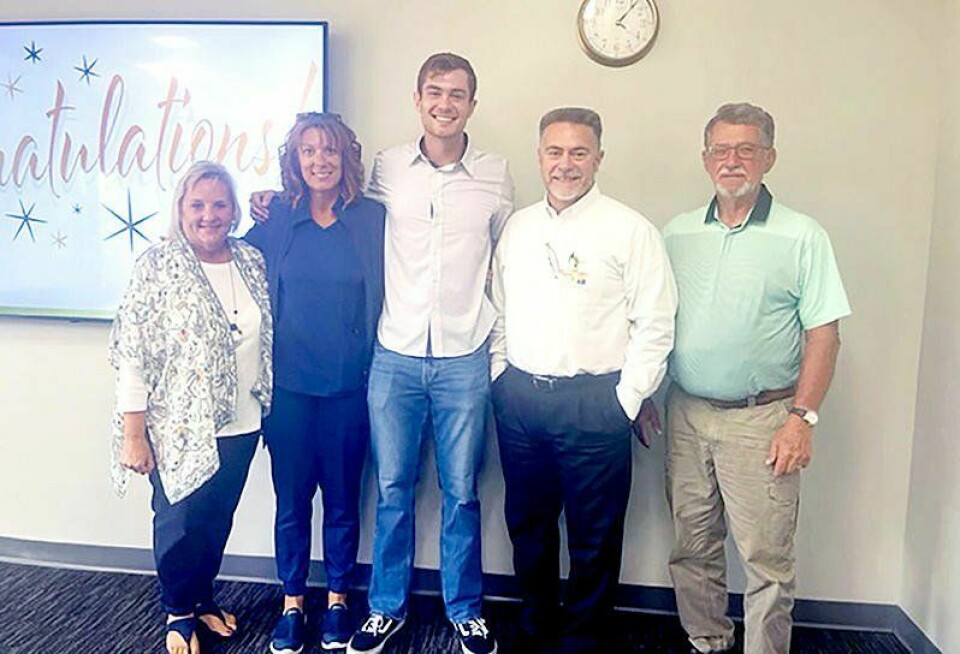Pomerene Hospital Auxiliary recently awarded its annual scholarship. Pictured are Jamie Tippett, left, board of directors; Bethany Amicone, Pomerene nurse practitioner; Tate Amicone, recipient; Jason Justus, CEO; and Mel Yoder, president of the board of directors. Pomerene Health Foundation awards $4,000 scholarship