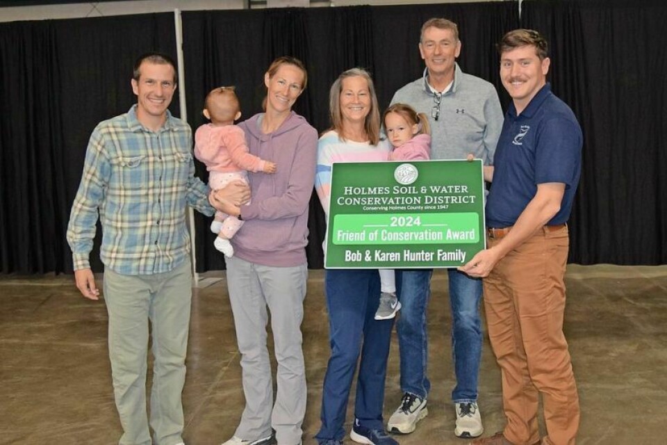 The Bob and Karen Hunter family was awarded the Holmes SWCD Friend of Conservation at the annual SWCD meeting on Nov. 19. Hunter family honored at Holmes SWCD’s annual meeting
