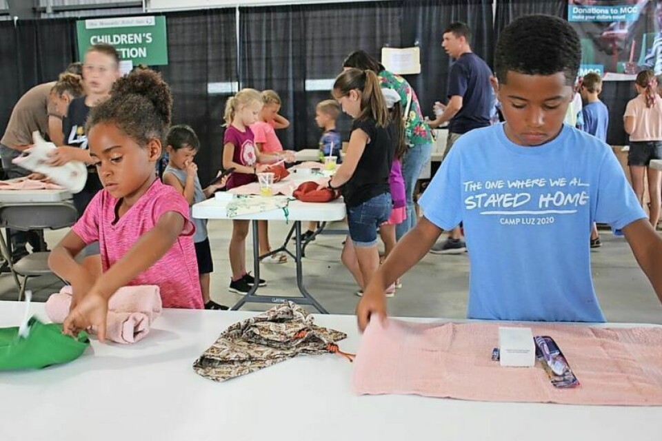 Sara and Isaac Obri prove one is never too young to lend a helping hand when it comes to serving others around the globe. The care package kits created by Mennonite Central Committee reach millions, and the upcoming fundraising event in Winesburg on April 12 will help raise funds to build a new facility in Kidron. MCC to host fundraiser banquet for new building project