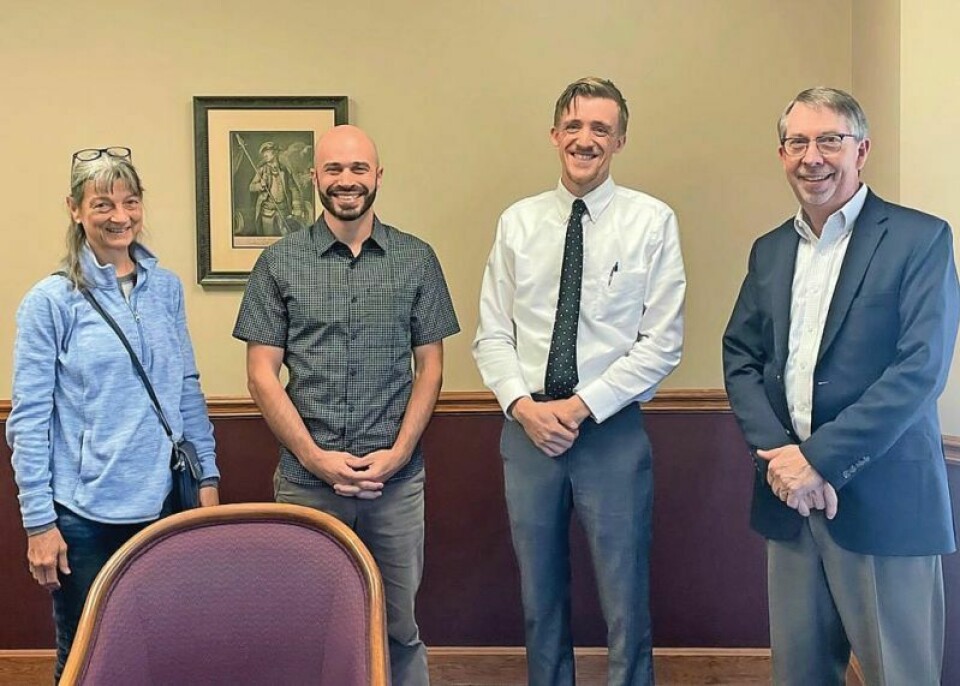 Beth Ladrach, left, the president of Local Roots, FoodSphere president Matt Mariola and board member Robert Stutzman, and Darrell Smucker of Farmers National Bank after FoodSphere closed the deal on the building at 146 W. South St. in Wooster, the future home of FoodSphere and Local Roots. FoodSphere, Local Roots a step closer to new home