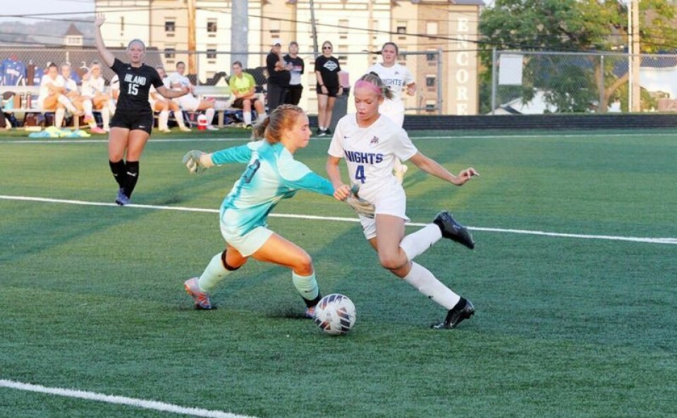 West Holmes’ freshman scoring sensation Charli Murphy works her way past Hiland keeper Bryn Yoder. Murphy scored twice in the WHHS win, but this one wasn’t one of them, with Murphy getting whistled for being offside. West Holmes girls soccer zooms past Lady Hawks