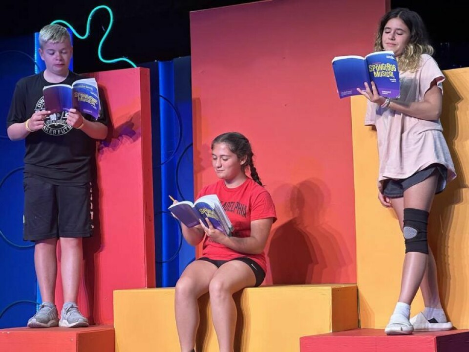 Finn Blocker, left, Olivia Alexander and Kiki Brown practicing the blocking for SpongeBob. Little Theatre youth learn in children’s workshop