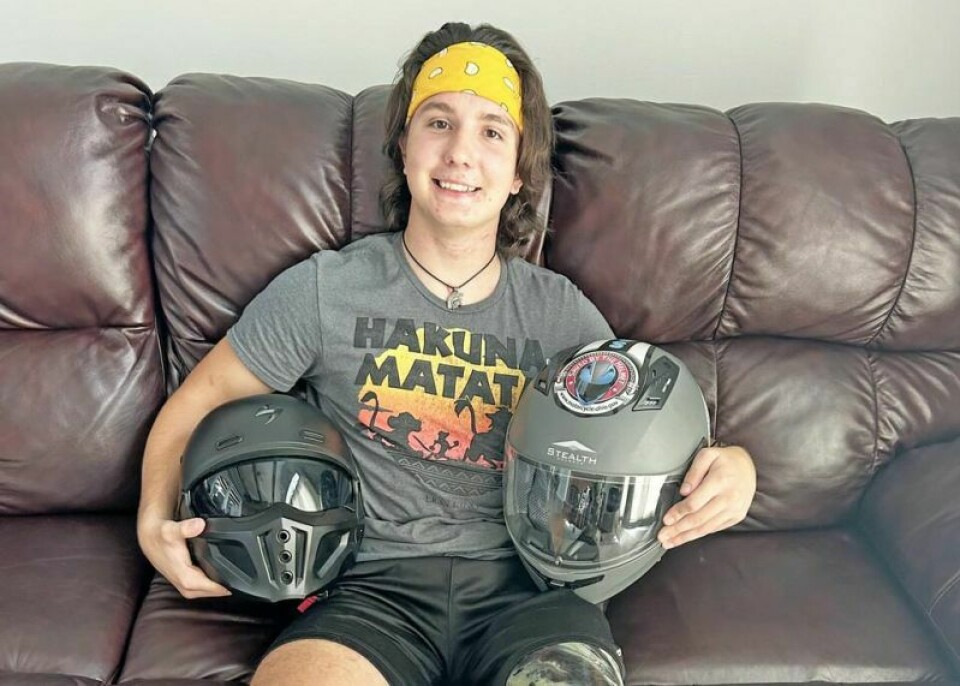 Bradie Ramella, of Dalton, recently received a new helmet, right, from Motorcycle Ohio as part of its 'Saved by the Helmet' campaign. Ramella lost his left leg and suffered a brain injury in the accident last year, but wearing a helmet is credited with helping save his life. Dalton accident survivor gets “Saved by the Helmet” award