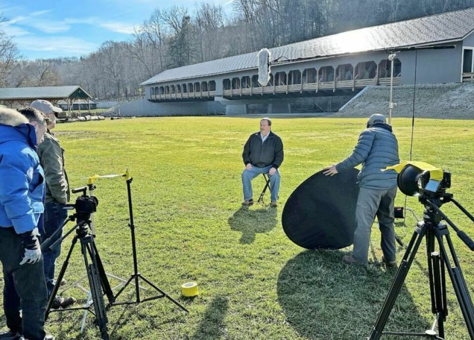 Holmes County commissioner Dave Hall takes his turn being interviewed in front of Spellacy Covered Bridge in Loudonville for the video being created as part of the collaboration on the bridge that led to the Don Conaway LPA Partnering Award. Spellacy Bridge entities come together for award