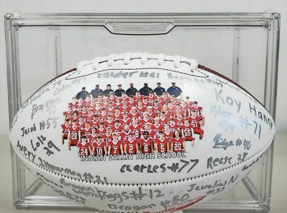 A 2023 auction item: season football signed by team and coaches with case, donated by IV High School’s football team/athletic department. Indian Valley Foundation to host gala