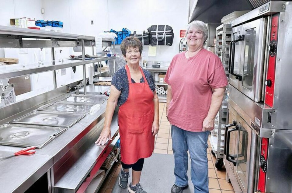 Current and retiring Holmes County Darb Snyder Senior Center Director Georgie Cool, left, and center business manager Penny Hamilton have spent recent days in the kitchen. The hope is to hire a new director and a new head cook that will help the organization restructure its director’s role. Darb Snyder Senior Center seeks to fill director’s position
