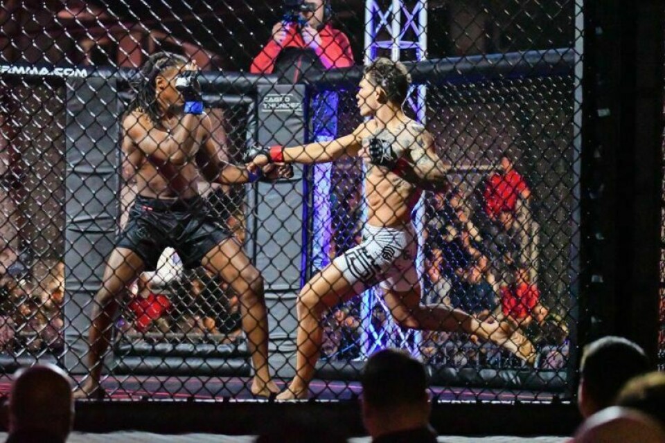 Professional MMA fighter Lucas Mast, right, evened up his professional career at 2-2 with a victory over a talented opponent in J-Mar “The Martian” Moore during Caged Thunder at Harvest Ridge on Saturday, Nov. 18. Event puts local MMA fighters in the spotlight