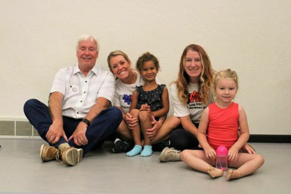 State Sen. Al Landis, left, Lacey Herbert-Stephen, Kaylynn Reichman, 5, of Dover, Farrah Raines and Darcy Krebs, 4, of Sugarcreek at the Lacey Performing Arts Adaptive Movement Center, which will soon open in New Philadelphia. Landis visits adaptive movement center