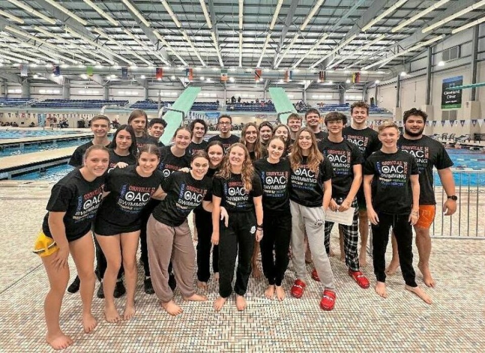 Members of the Orrville Area Conglomerate swim team are shown before a meet at the SPIRE Institute last month. The team includes swimmers from Central Christian, Dalton, Orrville, Smithville, Chippewa and Waynedale high schools. Local swimmers join together as team in Orrville