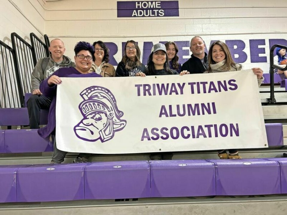 Triway High School graduates coming together to form the Triway Titans Alumni Association are Travis Snyder, left, President Angie Giltner, Jennifer Hatfield, Angie Perman, Melissa Snyder, Grace Perman, Kevin Root and Katie Starr. Triway High School forms new alumni association