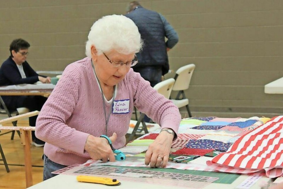 During the annual MCC Comforter Bash at Fairlawn Mennonite Church, Edna Ressler was one of more than 400 volunteers to show up and create comforters that will go all around the world to those in need. Annual Ohio MCC Comforter Bash produces yet again
