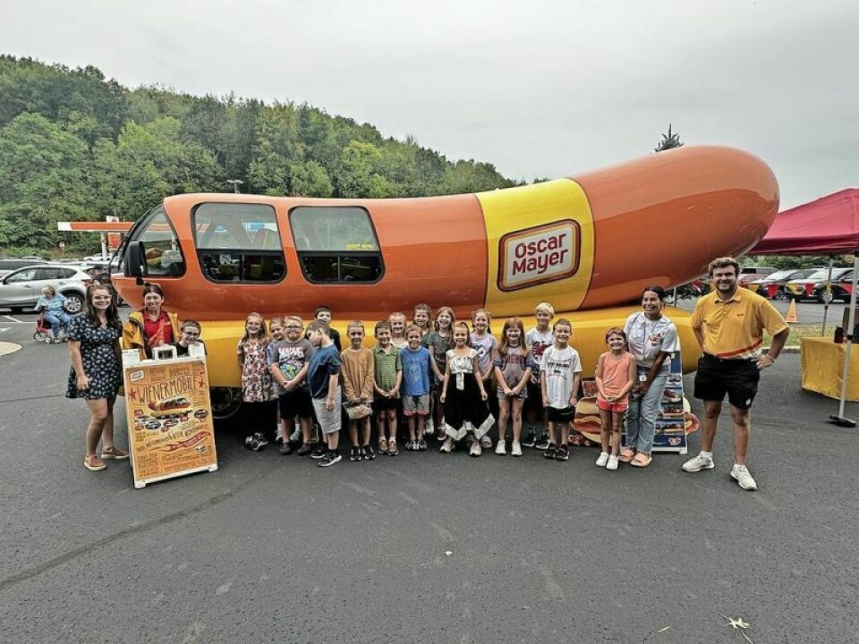 The Oscar Mayer Wienermobile found a parking spot at Rodhe’s Marketplace, where the Millersburg second-grade class of Melissa Bluck enjoyed a visit. Wienermobile a happy hit as part of Rodhe’s 90th celebration