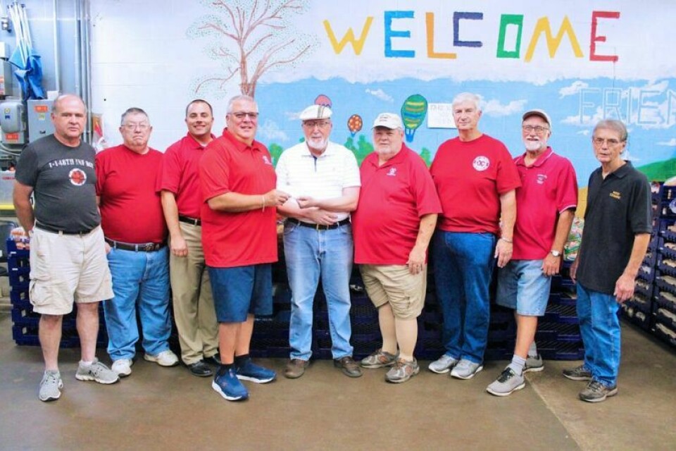Rick Moss, left, Rick Johnston, Shane Gunnoe, Kevin Korns, Bill Fritz, Rockne Clark, Larry Williams, Eric Hay and Fred Tedesco Dover Exchange Club impact on the community continues