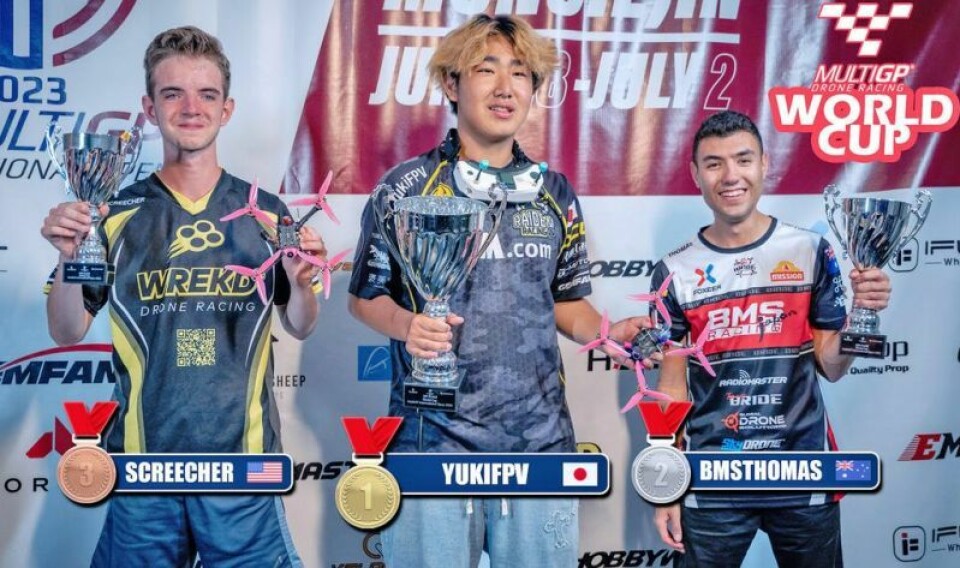Spencer Cannizzaro, left, who only started flying FPV drones a little over two years ago, recently placed third in the MPG International Open. On the podium with him are Yuki Hashimoto of Japan and Thomas Bitmatta of Australia. Drone-racing teen is third in the world