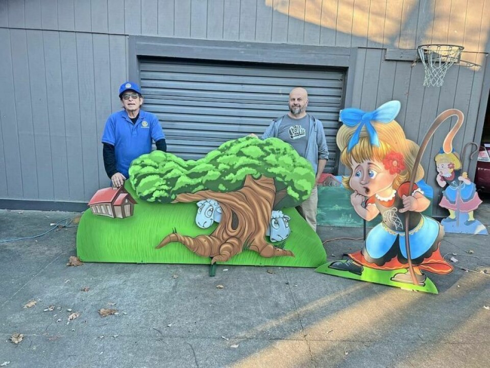 Tom Police, left, and Greg Scott with the new “Little Bo Peep.” Community support essential for success of Storybook Lane