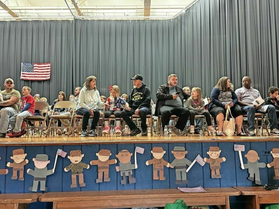 The entire student body at Millersburg got involved with the celebration, including students who crafted colorful photos of various branches of the Armed Forces personnel that highlighted the stage. Behind the drawing sits many veterans and their children and grandchildren who invited them to the event. Millersburg Elementary students sing praises of local veterans
