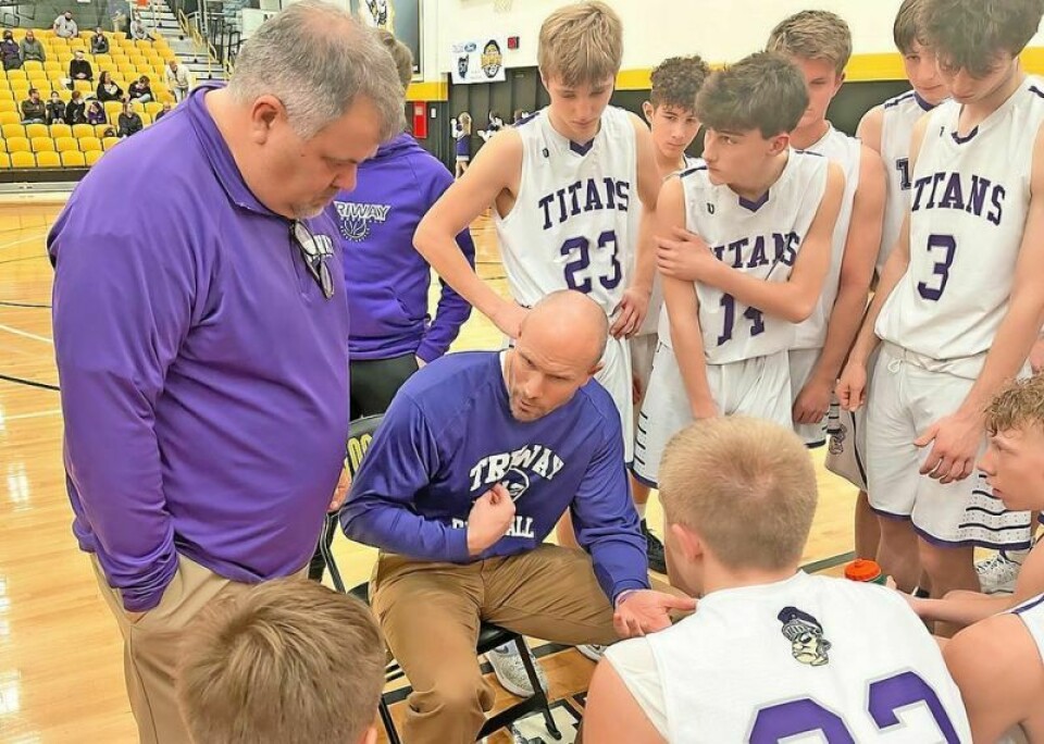 After a 99-49 record in six seasons leading the Triway boys basketball team, Ben Holt, center, was informed recently that he would not be brought back as the head coach. Triway High parts ways with boys basketball coach