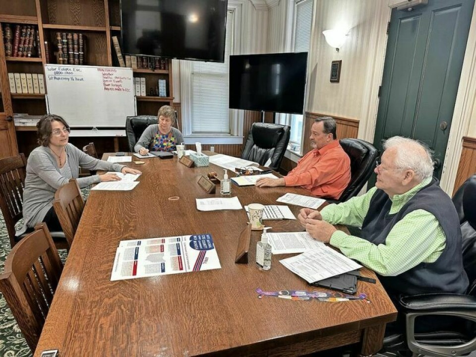 Holmes County clerk of courts Ronda Steimel, left, met with the Holmes County Board of Commissioners on Monday, April 8 to hammer out details that will keep the Holmes County Department of Motor Vehicles in the Clinton Street building in Millersburg for the next five years. DMV to continue operating out of Clinton Street facility