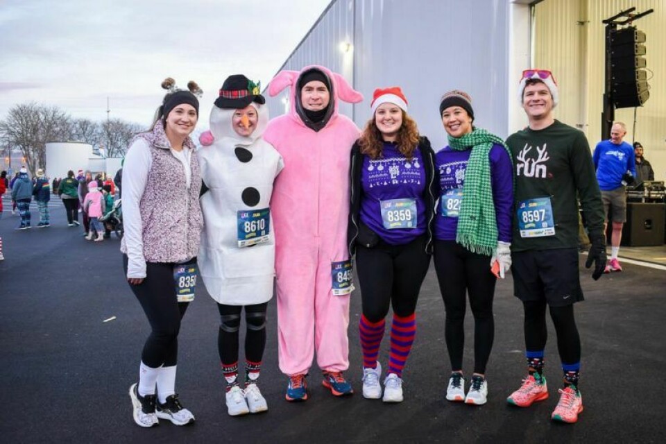 Race participants dress in holiday costumes. Earning this year’s Most Dashing award was Emily Rownd from Cuyahoga Falls. 1,000 elves participate in 5k