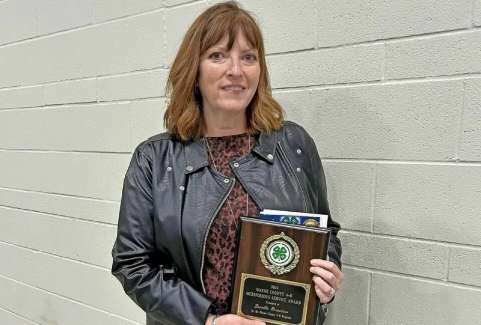 Janelle Firestone was awarded the Meritorious Service Award, the most prestigious honor presented to a 4-H volunteer or supporter, at the recent Wayne 4-H recognition banquet. Awards presented, volunteers honored at Wayne 4-H banquet