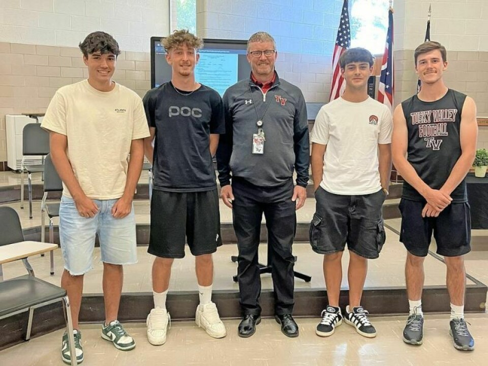 Aitor Zamarripa-Molina, left, Aron Gartzke, Principal Jason Phillips, Alejandro Fernandez Serrano and Noe Quastana. Tusky Valley welcomes exchange students