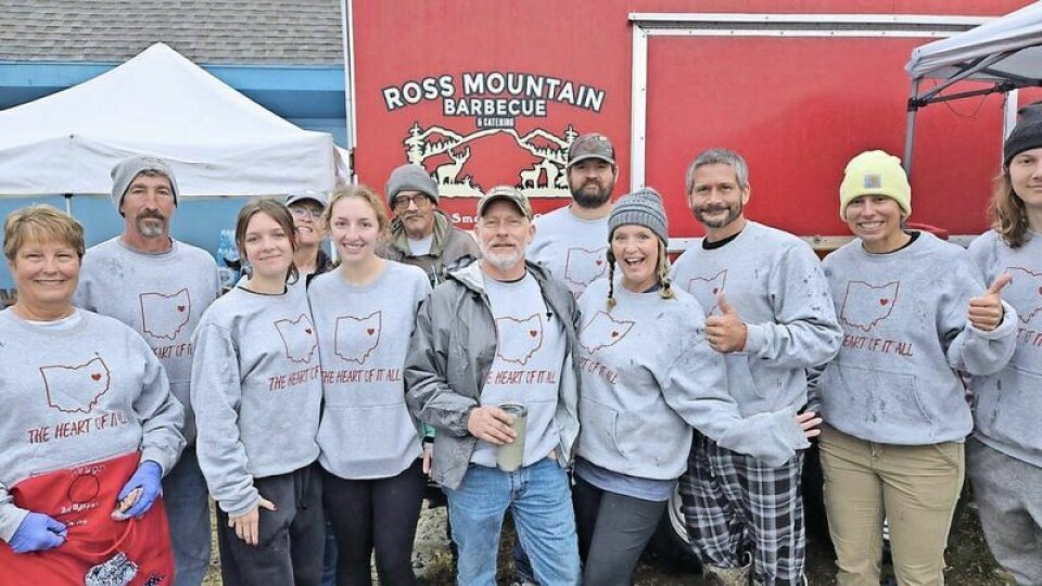 Volunteers prepare to serve meals; 4,100 meals were served to hard-hit residents and workers in North Carolina. Relief effort helps people in North Carolina