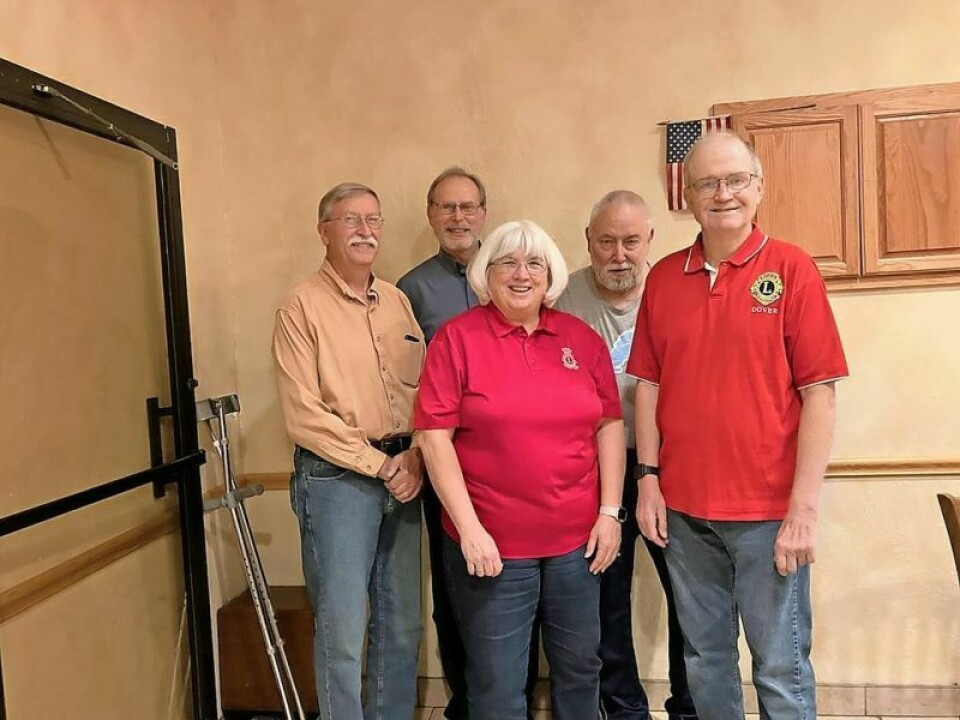Eric Botdorf, treasurer, left; Mary Ellen Sherer, secretary; Scott Derr, president; rear, Brian Botdorf, second vice president; and Bill Cozart, first vice president. Dover Lions Club celebrates their 80th anniversary