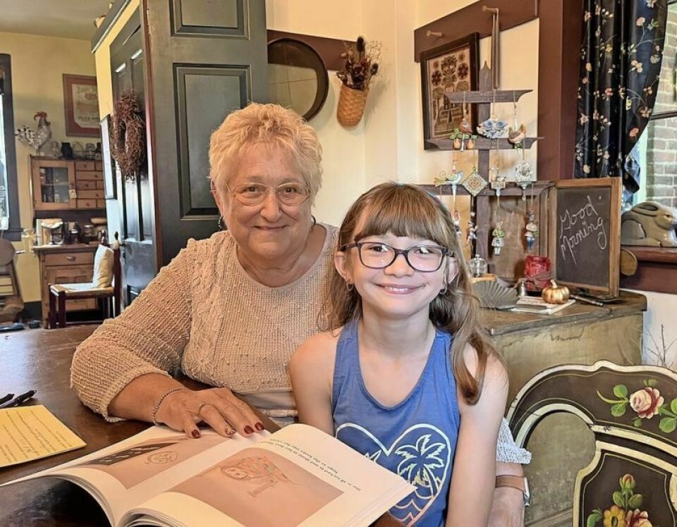 Diane Geis, left, of Zoar and her granddaughter Lavinia Geis have written a bedtime story to address the common childhood fear of the dark. Local girl and her grandmother pen children’s book