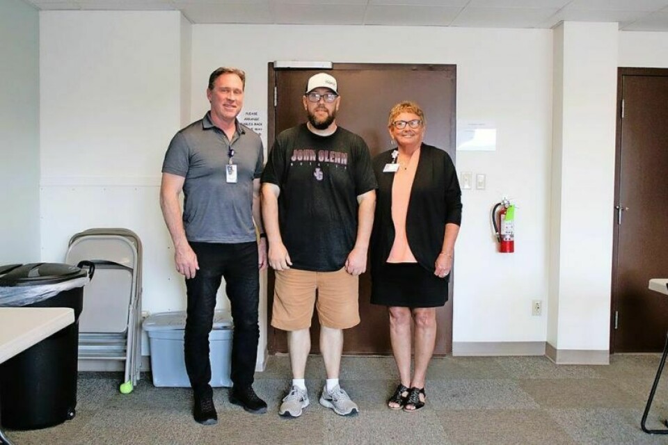Dr. Timothy McKnight, Caleb Raymond and Kelly Bowe met recently to discuss the Fit for Life program. Fit for Life registering students for fall class