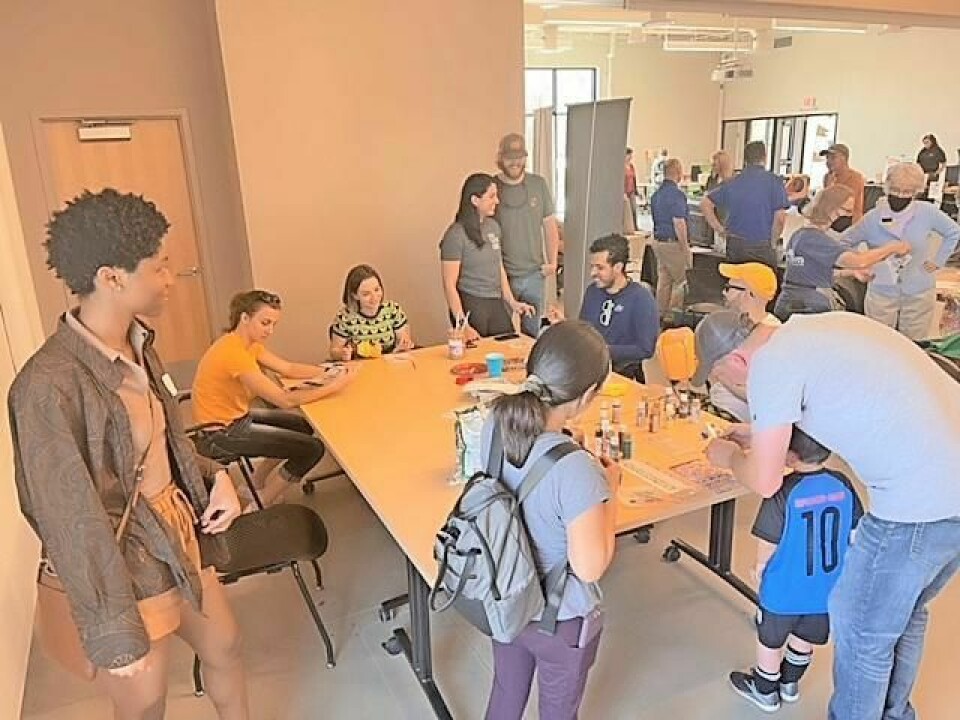 Attendees at a recent Scarlet, Gray and Green Fair use recycled materials to build nursery containers. This year's fair will be April 20 at the Secrest Welcome and Education Center in Wooster. Scarlet, Gray and Green Fair resumes Earth Day tradition