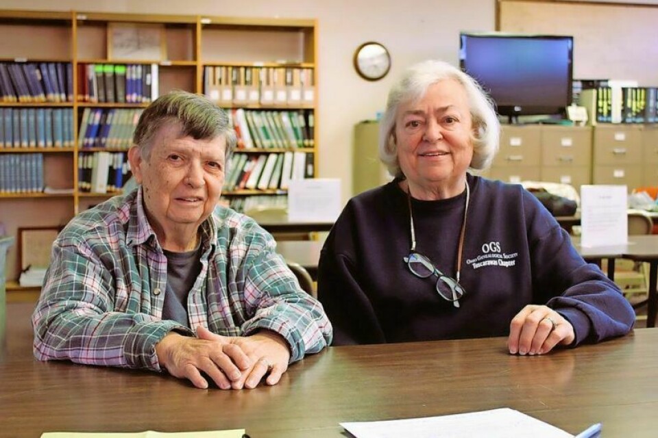 Volunteers Emma McMannamy of Bowerston, president of the Tuscarawas County Genealogical Society, and Christy Walker of Tuscarawas, who serves as vice president at the TCGS Library in Dennison. Tuscarawas County Genealogical Society here to help