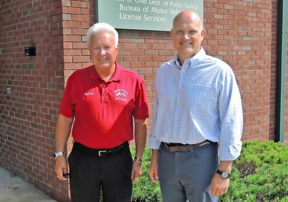 Wayne County Clerk of Courts Tim Neal, left, and State Rep. Scott Wiggam pose in front of the Title Office in the Vanover Building in Wooster. The duo worked to pass House Bill 373, which grants authority for Ohio Title Offices to conduct inspections on vehicles purchased out of state, a measure that will save buyers the frustration of having to visit multiple offices to have vehicles inspected and titled. Locals help improve title process for Ohioans