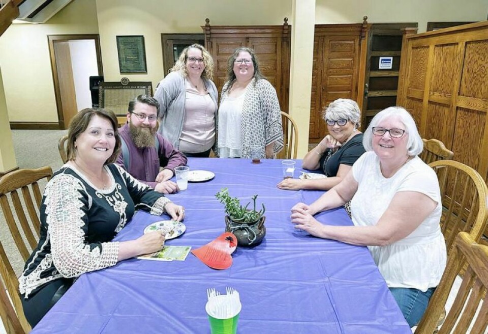 Fellow employees and board members of the Holmes County Chamber of Commerce and Tourism Bureau as well as friends and family stopped by the chamber office in Millersburg on Friday, Aug. 4 to celebrate with Shannon Carter, standing left beside Executive Director Tiffany Gerber. Carter is leaving to take on a starring role for the Medina County Chamber and Tourism Bureau. Carter bids Holmes adieu to take tourism role in Medina