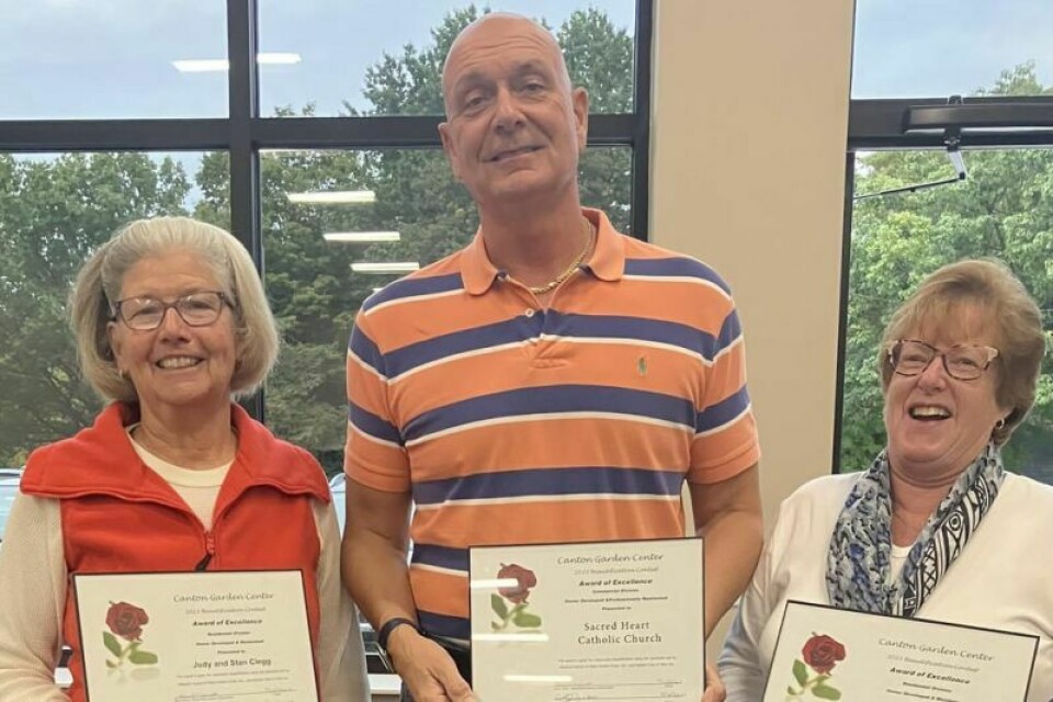 Judy Clegg, left, Matt Fantin and Trudy Brown Gardeners are recognized