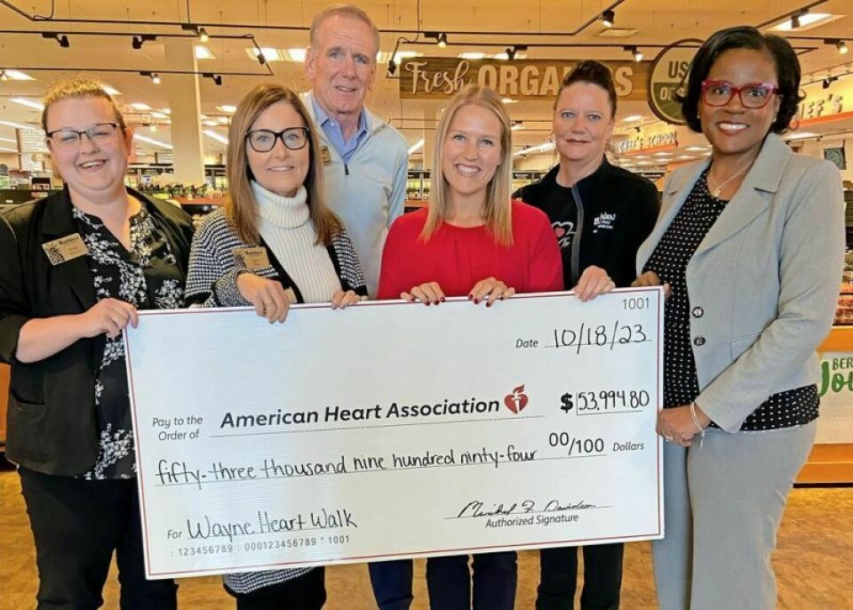 For the fifth year in a row, Buehler’s Fresh Foods joined the fight against heart disease and stroke by supporting the American Heart Association. Presenting a check to AHA Executive Director Lisa Wheeler-Cooper, right, and AHA Senior Development Director Samantha Campbell, fourth from left, are Buehler’s Milltown service and facilities manager Hope Murray, left, Buehler’s Milltown store manager Geri Shie, Buehler’s President and CEO Mike Davidson and Leigh Grove of Buehler’s Employee Experience/Community Relations. Buehler’s campaign raises nearly $54,000 for AHA